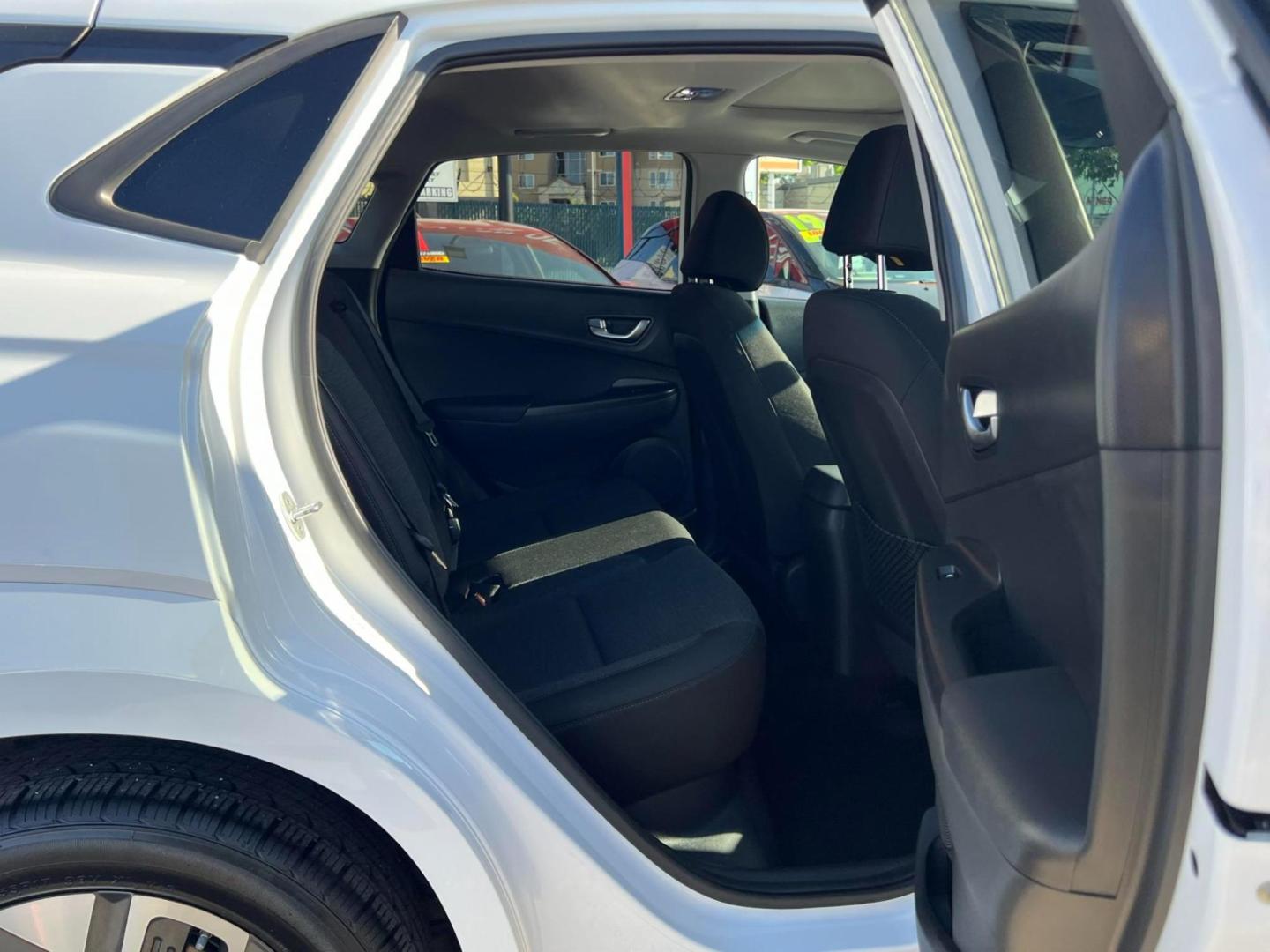 2022 WHITE /BLACK Hyundai Kona EV Limited (KM8K33AG4NU) with an ELECTRIC engine, 1A transmission, located at 722 E Miner Ave, Stockton, CA, 95202, (209) 871-6645, 37.956711, -121.282310 - PLUS TAXES AND FEES - Photo#10