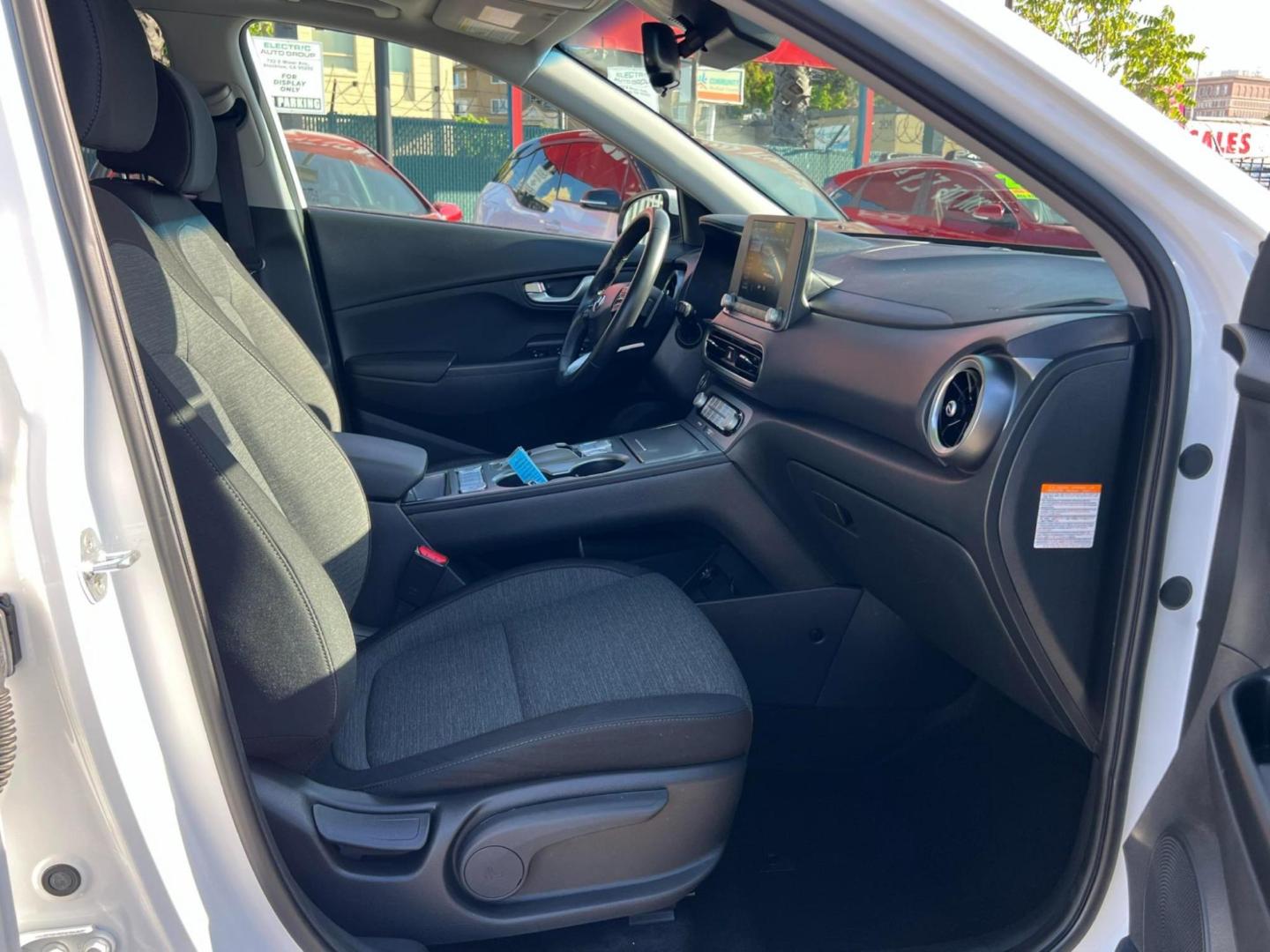 2022 WHITE /BLACK Hyundai Kona EV Limited (KM8K33AG4NU) with an ELECTRIC engine, 1A transmission, located at 722 E Miner Ave, Stockton, CA, 95202, (209) 871-6645, 37.956711, -121.282310 - PLUS TAXES AND FEES - Photo#11