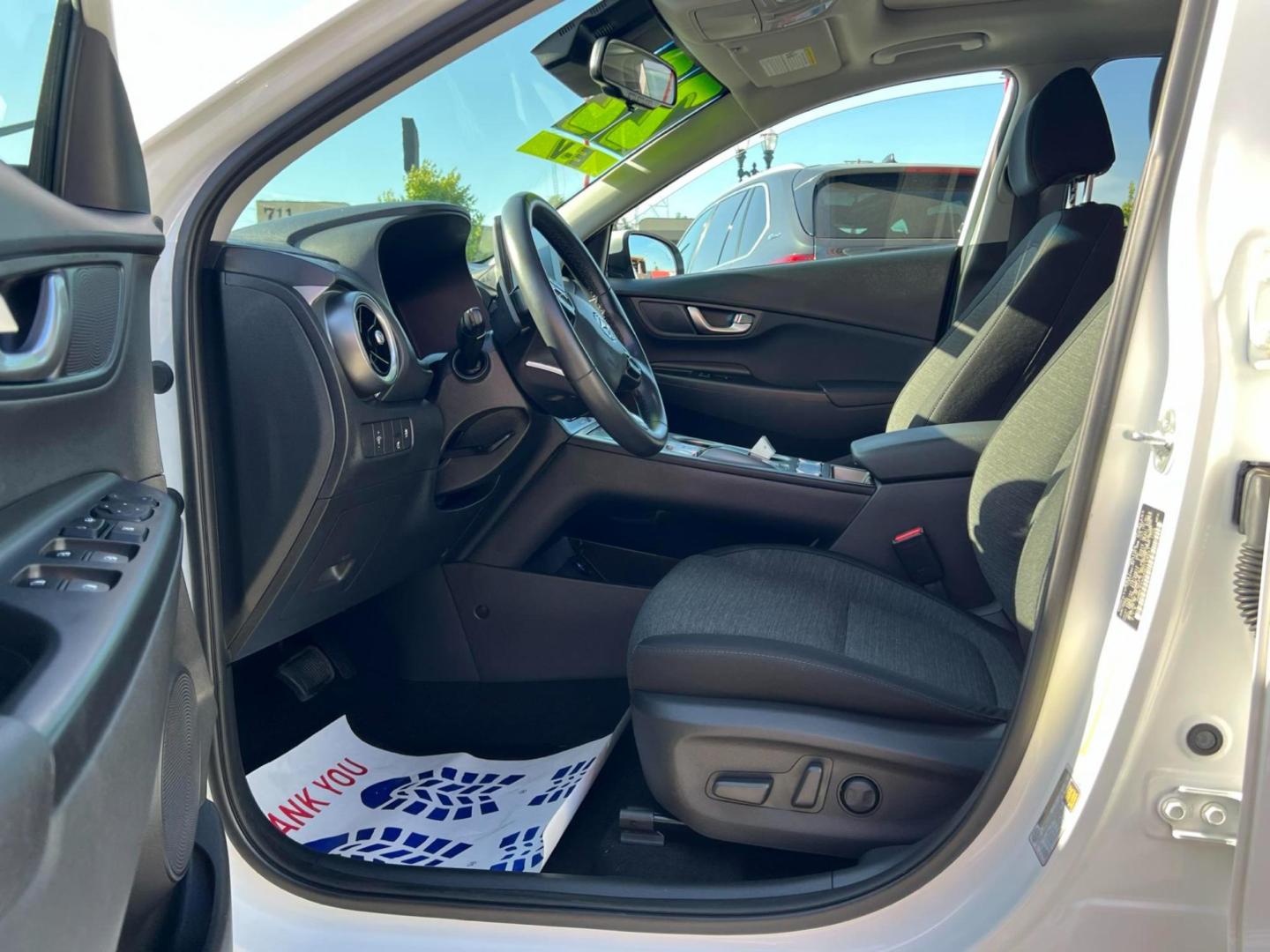 2022 WHITE /BLACK Hyundai Kona EV Limited (KM8K33AG4NU) with an ELECTRIC engine, 1A transmission, located at 722 E Miner Ave, Stockton, CA, 95202, (209) 871-6645, 37.956711, -121.282310 - PLUS TAXES AND FEES - Photo#7