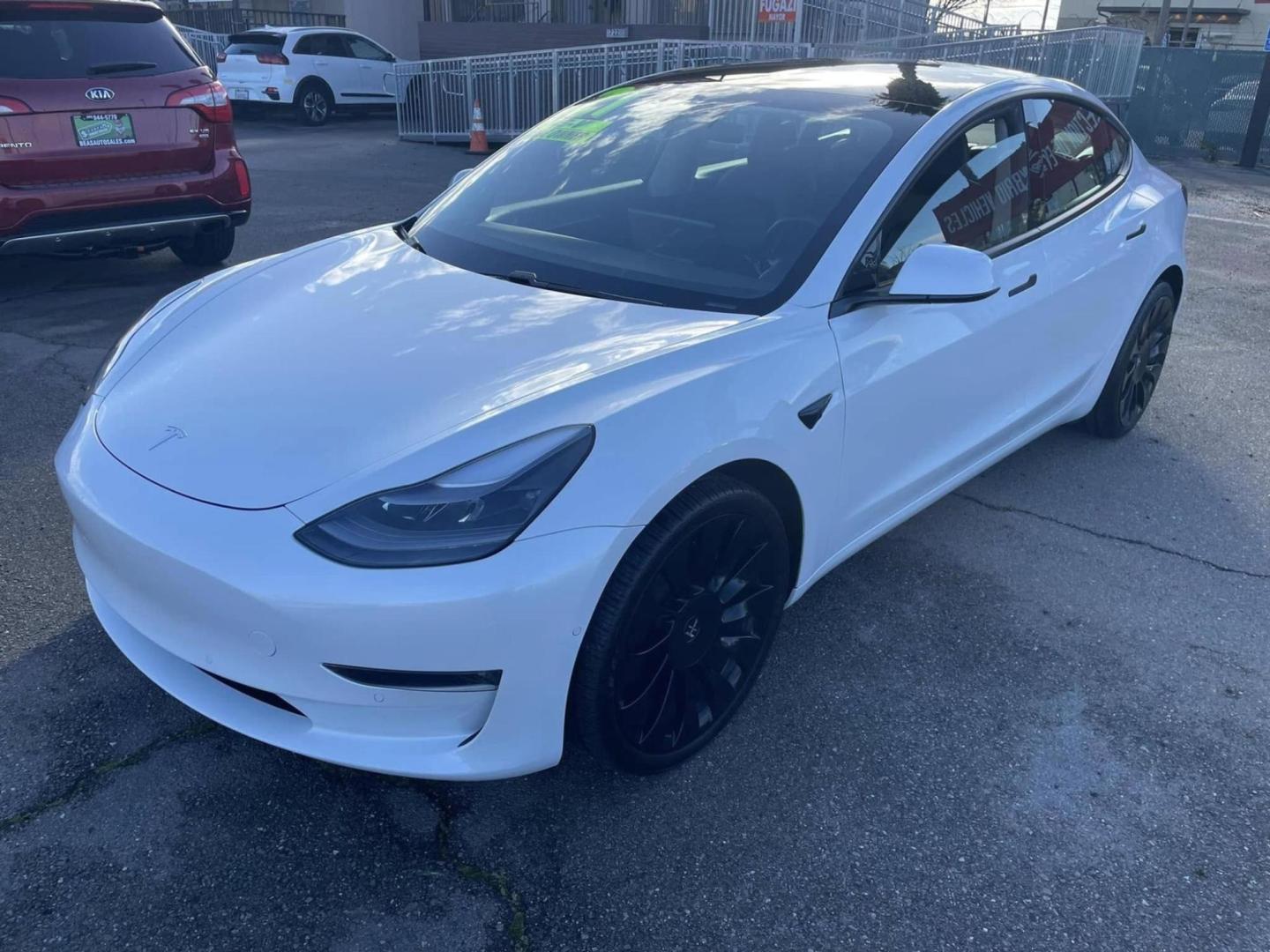 2021 WHITE Tesla Model 3 Long Range (5YJ3E1EB1MF) with an ELECTRIC engine, 1A transmission, located at 722 E Miner Ave, Stockton, CA, 95202, (209) 871-6645, 37.956711, -121.282310 - PLUS TAXES AND FEES NO CHARGER AVAILABLE - Photo#4